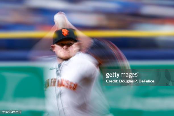 Logan Webb of the San Francisco Giants throws a pitch during the second inning against the Tampa Bay Rays at Tropicana Field on April 13, 2024 in St...