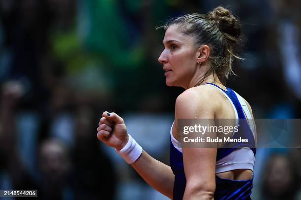 Beatriz Haddad of Brazil celebrates after winning the match against to Anna-Lena Friedsam of Germany during the Billie Jean King Cup Qualifier match...