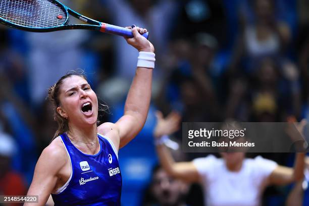 Beatriz Haddad of Brazil celebrates after winning the match against to Anna-Lena Friedsam of Germany during the Billie Jean King Cup Qualifier match...