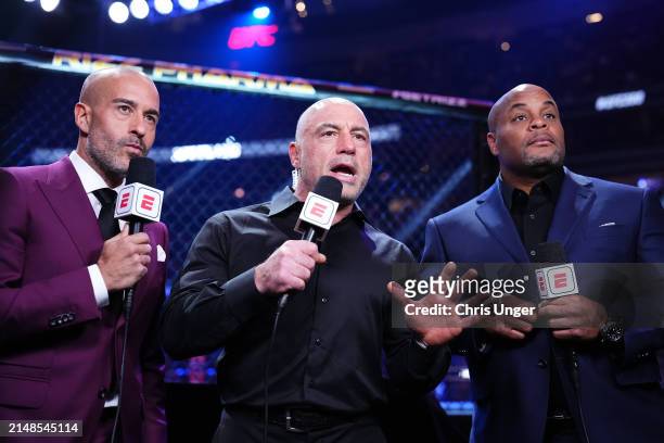 Jon Anik, Joe Rogan and Daniel Cormier announce the fights during the UFC 300 event at T-Mobile Arena on April 13, 2024 in Las Vegas, Nevada.