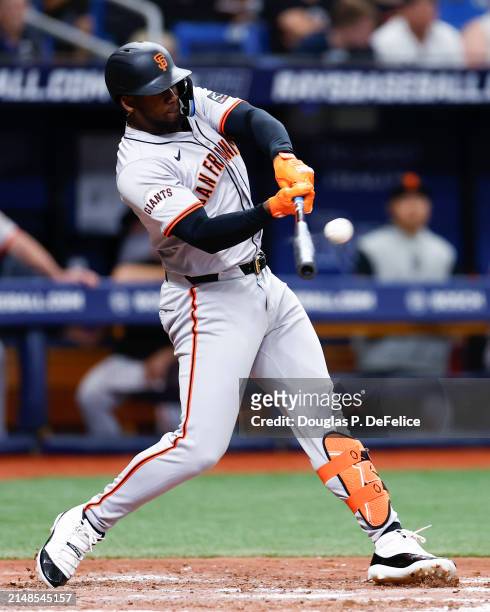 Jorge Soler of the San Francisco Giants hits a solo home run against the Tampa Bay Rays during the seventh inning at Tropicana Field on April 13,...