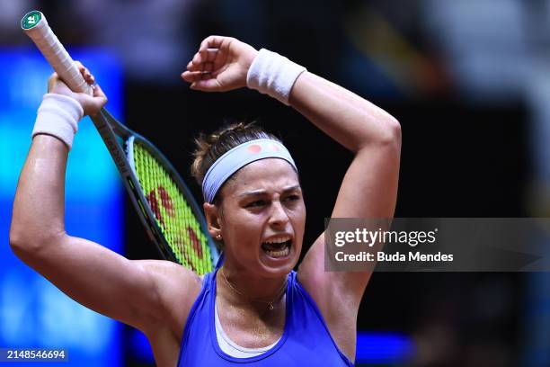 Carolina Alves of Brazil celebrates a point against Laura Siegmund of Germany during the Billie Jean King Cup Qualifier match between Brazil and...