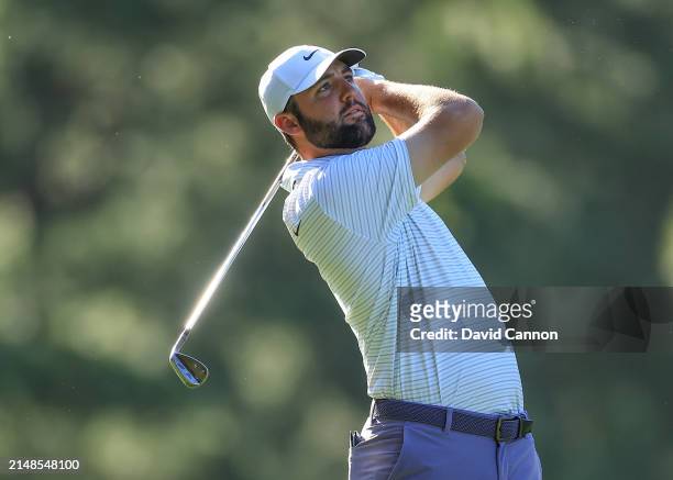 Scottie Scheffler of The United States plays his second shot on the 14th hole during the third round of the 2024 Masters Tournament at Augusta...