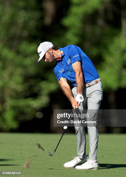 Max Homa of The United States plays his second shot on the 11th hole during the third round of the 2024 Masters Tournament at Augusta National Golf...