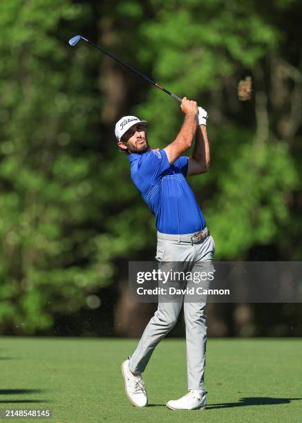 Max Homa of The United States plays his second shot on the 11th hole during the third round of the 2024 Masters Tournament at Augusta National Golf...