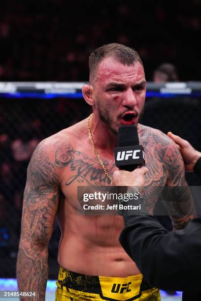 Joe Rogan interviews Renato Moicano of Brazil in a lightweight fight during the UFC 300 event at T-Mobile Arena on April 13, 2024 in Las Vegas,...