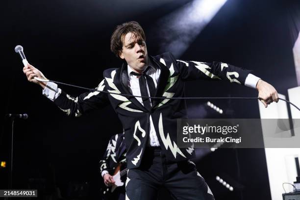Pelle Almqvist of The Hives performs at Eventim Apollo on April 13, 2024 in London, England.