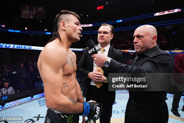 Joe Rogan interviews Diego Lopes of Brazil in a featherweight fight during the UFC 300 event at T-Mobile Arena on April 13, 2024 in Las Vegas, Nevada.