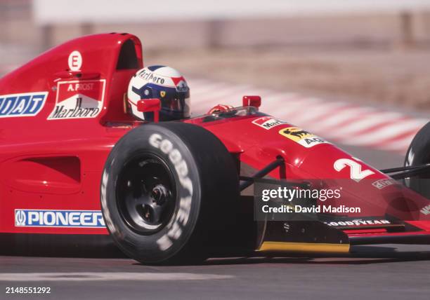 Alain Prost, #27, of the Ferrari team, drives to a second place finish in the Formula One United States Grand Prix held in Phoenix, Arizona in March...