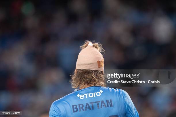 Luke Brattan of Sydney FC with a bandaged head during the A-League Men round 24 match between Sydney FC and Western Sydney Wanderers at Allianz...