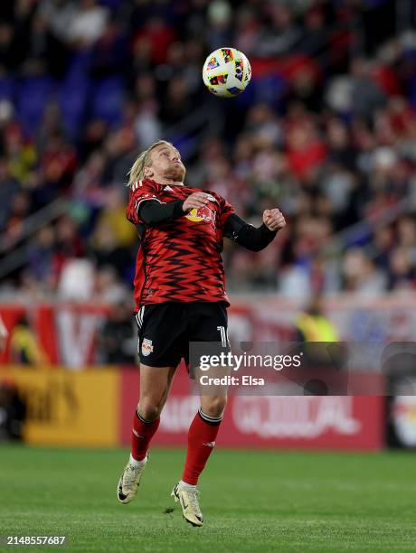 Emil Forsberg of New York Red Bulls heads the ball during the second half against the Chicago Fire at Red Bull Arena on April 13, 2024 in Harrison,...