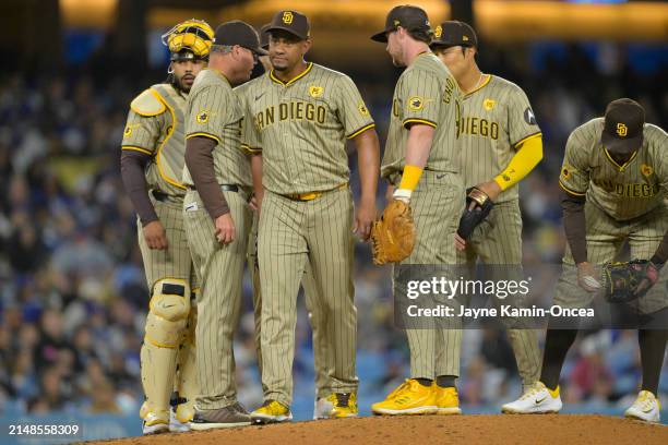 Wandy Peralta of the San Diego Padres is taken out of the game by manager Mike Shildt of during the game against the Los Angeles Dodgers at Dodger...