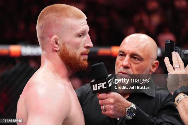 Joe Rogan interviews Bo Nickal in a lightweight fight during the UFC 300 event at T-Mobile Arena on April 13, 2024 in Las Vegas, Nevada.