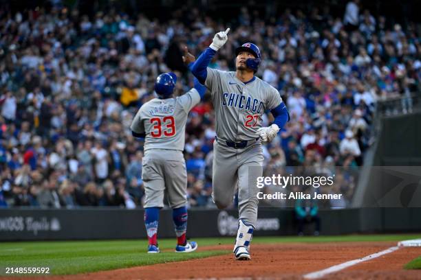 Seiya Suzuki of the Chicago Cubs gestures after hitting a home run during the third inning against the Seattle Mariners at T-Mobile Park on April 13,...