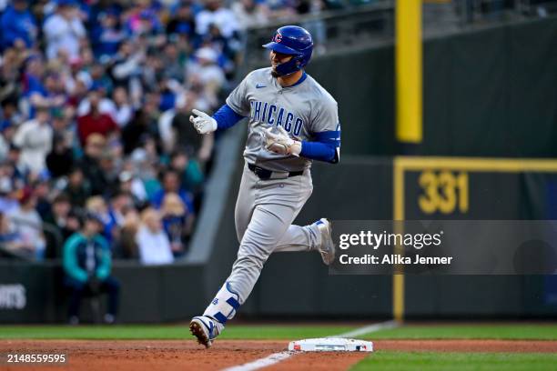 Seiya Suzuki of the Chicago Cubs gestures after hitting a home run during the third inning against the Seattle Mariners at T-Mobile Park on April 13,...