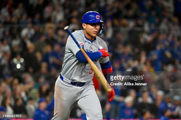 Miguel Amaya of the Chicago Cubs flips his bat after hitting a solo home run during the eighth inning against the Seattle Mariners at T-Mobile Park...