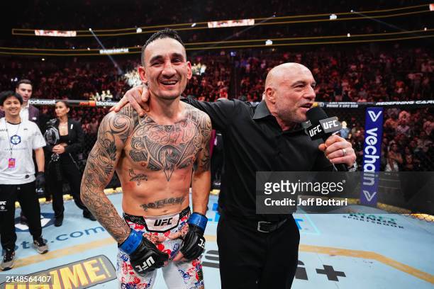 Joe Rogan interviews Max Holloway in the BMF championship fight during the UFC 300 event at T-Mobile Arena on April 13, 2024 in Las Vegas, Nevada.