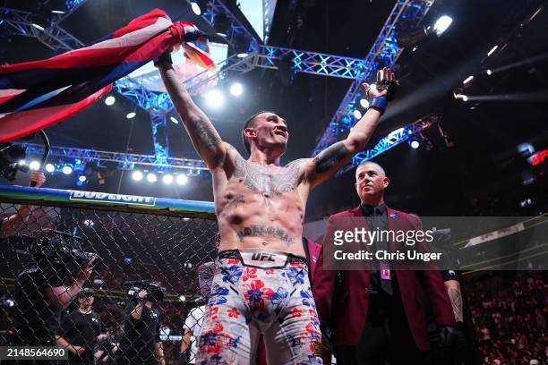 Max Holloway exits the Octagon in the BMF championship fight during the UFC 300 event at T-Mobile Arena on April 13, 2024 in Las Vegas, Nevada.