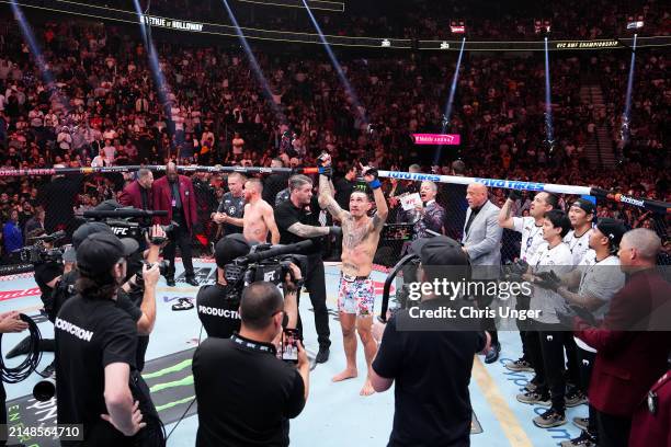 Max Holloway has his hand raised in the BMF championship fight during the UFC 300 event at T-Mobile Arena on April 13, 2024 in Las Vegas, Nevada.