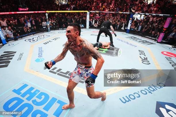 Max Holloway reacts to his knockout of Justin Gaethje in the BMF championship fight during the UFC 300 event at T-Mobile Arena on April 13, 2024 in...