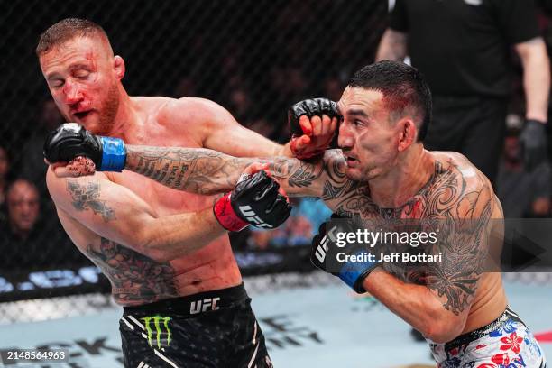 Max Holloway punches Justin Gaethje in the BMF championship fight during the UFC 300 event at T-Mobile Arena on April 13, 2024 in Las Vegas, Nevada.