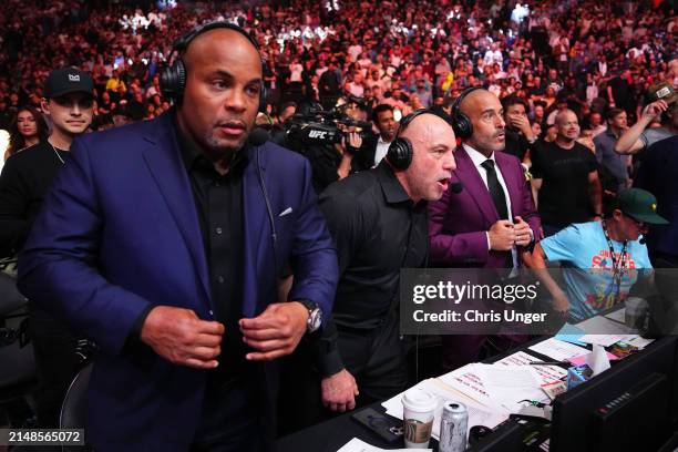 Daniel Cormier, Joe Rogan and Jon Anik react to the knockout of Justin Gaethje in the BMF championship fight during the UFC 300 event at T-Mobile...