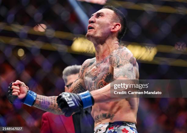 Max Holloway reacts to defating Justin Gaethje in their BMF title fight at T-Mobile Arena on April 13, 2024 in Las Vegas, Nevada.