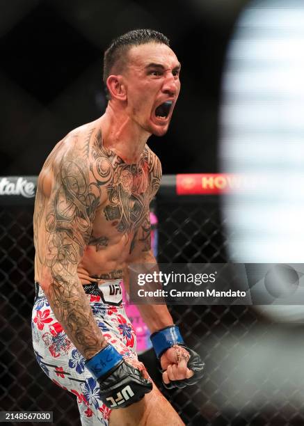 Max Holloway reacts to defating Justin Gaethje in their BMF title fight at T-Mobile Arena on April 13, 2024 in Las Vegas, Nevada.