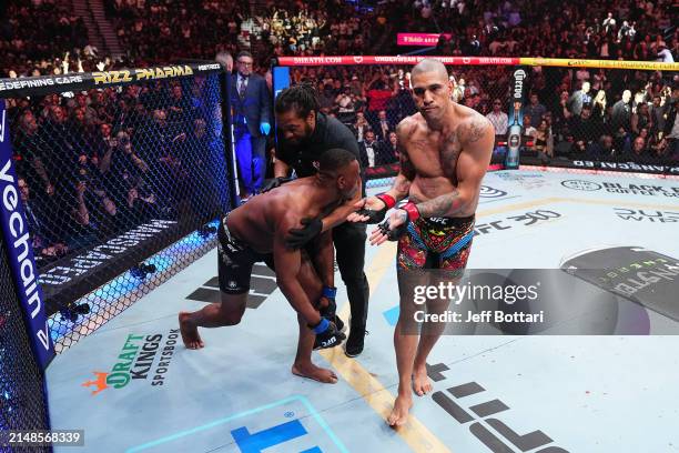 Alex Pereira of Brazil reacts to his knockout of Jamahal Hill in the UFC light heavyweight championship fight during the UFC 300 event at T-Mobile...
