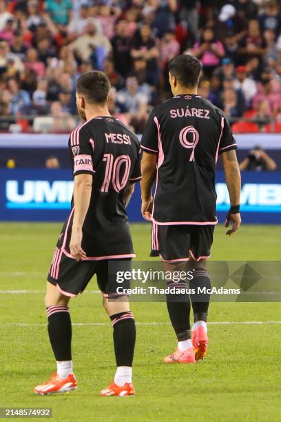 Inter Miami forward Lionel Messi and Luis Suárez during an MLS match between Inter Miami CF and Sporting Kansas City on Apr 13, 2024 at GEHA Field at...