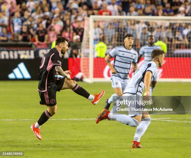 Lionel Messi of Inter Miami dribbles during the second half against Sporting Kansas City at Arrowhead Stadium on April 13, 2024 in Kansas City,...