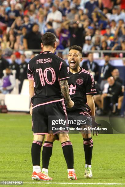 Lionel Messi of Inter Miami celebrates with teammates after scoring a second half goal during a Major League Soccer game against the Sporting Kansas...