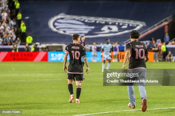 Fan rushes the pitch during the MLS football match between Sporting Kansas City and Inter Miami CF at the Arrowhead Stadium in Kansas City, Missouri,...