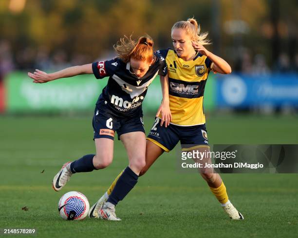 Beattie Goad of Melbourne Victory and Faye Bryson of the Mariners contest for the ball during the A-League Women Elimination Final match between...
