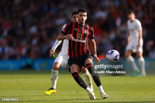 Dominic Solanke of AFC Bournemouth in action with Casemiro of Manchester United during the Premier League match between AFC Bournemouth and...