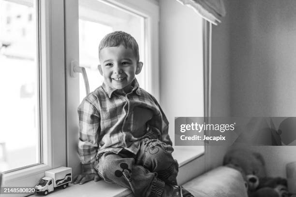 cheerful boy at home - black and white instant print stock pictures, royalty-free photos & images