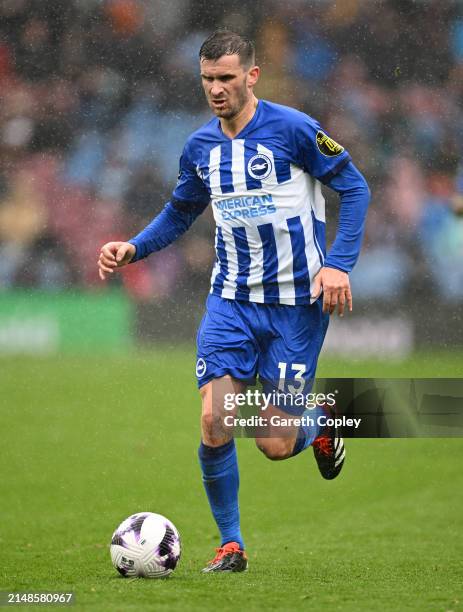 Pascal Groß of Brighton during the Premier League match between Burnley FC and Brighton & Hove Albion at Turf Moor on April 13, 2024 in Burnley,...