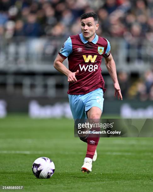 Josh Cullen of Burnley during the Premier League match between Burnley FC and Brighton & Hove Albion at Turf Moor on April 13, 2024 in Burnley,...