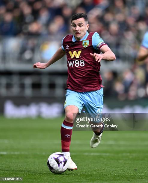 Josh Cullen of Burnley during the Premier League match between Burnley FC and Brighton & Hove Albion at Turf Moor on April 13, 2024 in Burnley,...