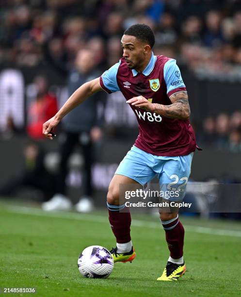 Vitinho of Burnley during the Premier League match between Burnley FC and Brighton & Hove Albion at Turf Moor on April 13, 2024 in Burnley, England.