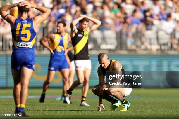 Dustin Martin of the Tigers takes a moment during the round five AFL match between West Coast Eagles and Richmond Tigers at Optus Stadium, on April...