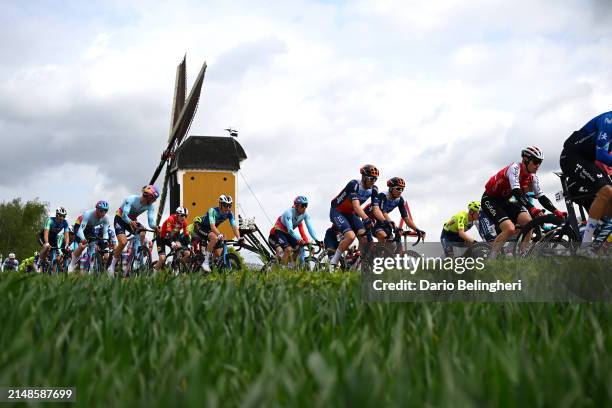 Luke Durbridge of Australia and Team Jayco AlUla, Ben Hermans of Belgium and Team Cofidis and a general view of the peloton competing close to a...