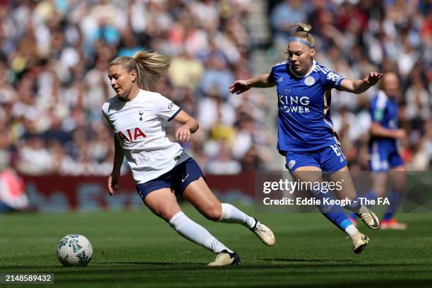 Amanda Nilden of Tottenham Hotspur battles for possession with Jutta Rantala of Leicester City during the Adobe Women's FA Cup Semi Final between...