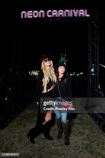 Paris Hilton and Kyle Richards attend Neon Carnival presented by Liquid I.V. In association with Patrón El Alto and The Levi's Brand on April 13,...