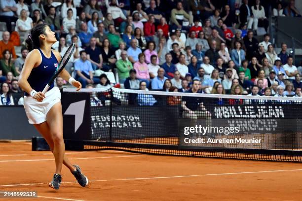 Emma Raducanu of Great Britain in action in her match against Diane Parry of France during the Billie Jean King Cup Qualifier match between France...