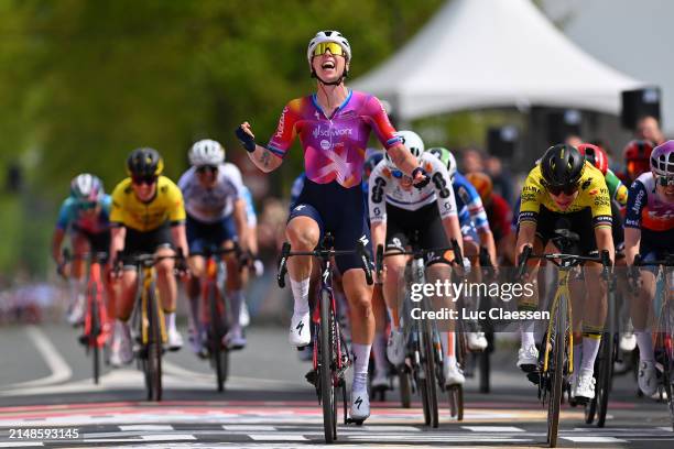 Lorena Wiebes of The Netherlands and Team SD Worx - Protime celebrates before crossing the finish line while Marianne Vos of The Netherlands and Team...