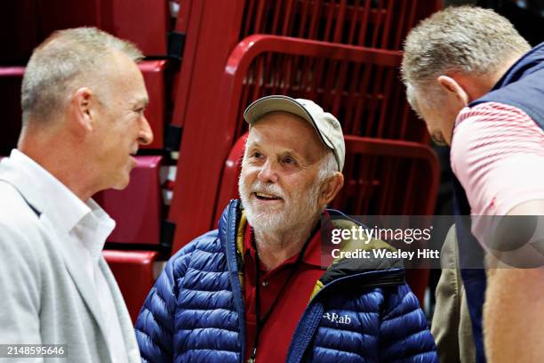 John Tyson of Tyson Foods talks with ESPN commentator Jimmy Dykes and former NBA and Razorback basketball player Joe Kleine at the introduction...