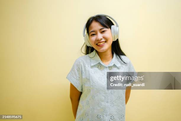 1,529 Portrait Of A Japanese Woman Listening To Music Stock Photos