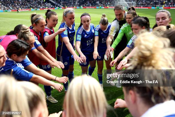 Leicester City players enter a huddle before extra time during the Adobe Women's FA Cup Semi Final between Tottenham Hotspur and Leicester City Women...