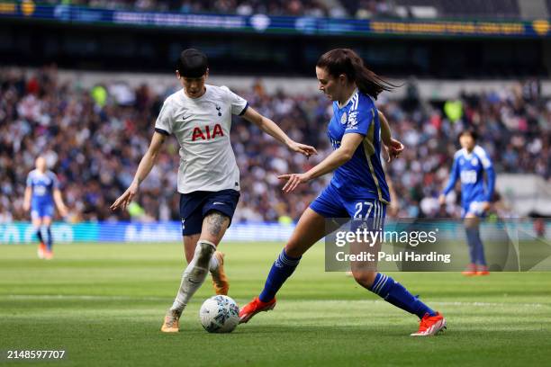 Shannon O'Brien of Leicester City is challenged by Ashleigh Neville of Tottenham Hotspur during the Adobe Women's FA Cup Semi Final between Tottenham...